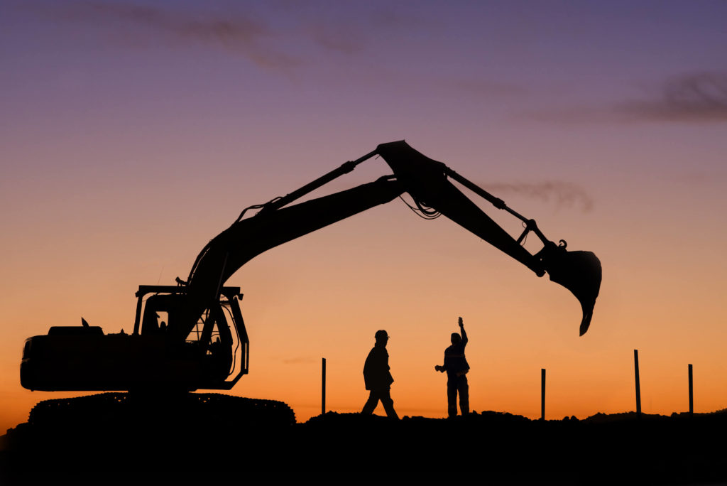 Excavator and Two Hardhats